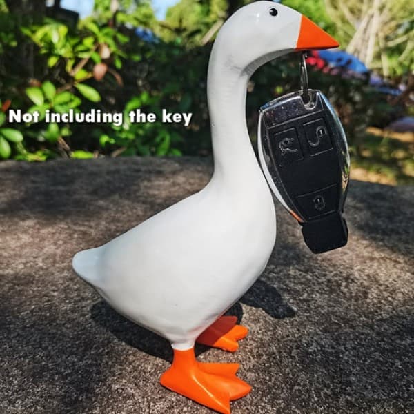 Magnetisk nøgleholder and -opbevaring i form af en and - Pe