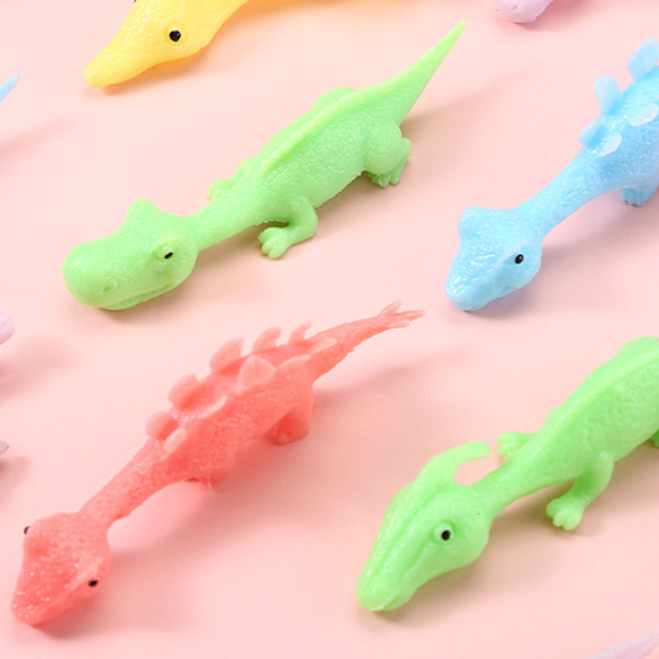 Små Slingshoting Dinosaur Finger Leksaker Anti Pressure Avkopplande Baubles Leksak För Barn Pojke Flicka 10pcs
