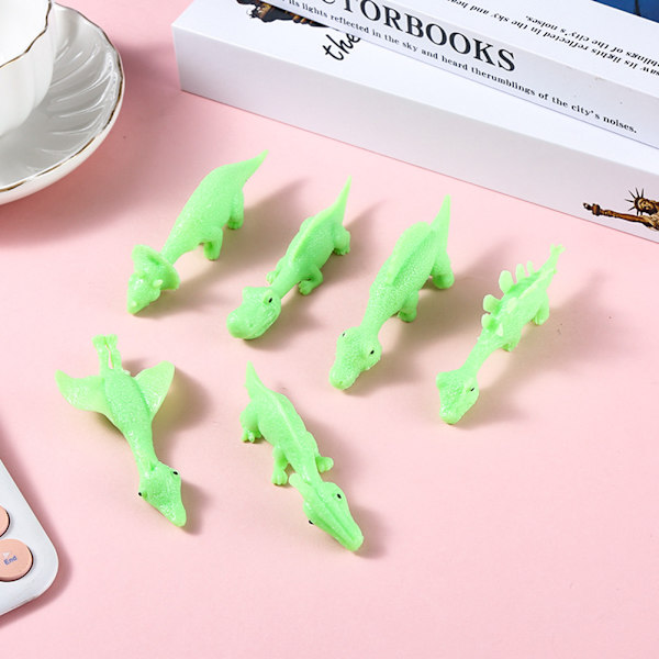Små Slingshoting Dinosaur Finger Leksaker Anti Pressure Avkopplande Baubles Leksak För Barn Pojke Flicka 10pcs
