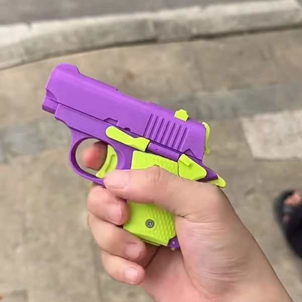 Bärbar mini pistolformad leksak Lättviktsdekompressionsleksakspresenter för vuxna barn Purple Green