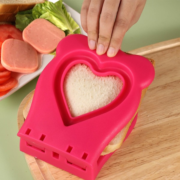 Molds Skärare och förseglare med hjärtformad multifunktionell skorpfri brödmaskin Gör-det-själv-bakverktyg Pink