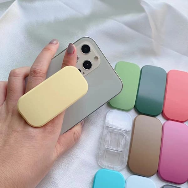 Värillinen spraymaalattu macaron-värinen läpinäkyvä push-pull-kiinnike, litteä tukikiinnike, yksivärinen puhelinteline läpinäkyvä Push pull -kiinnike transparent Push pull bracket