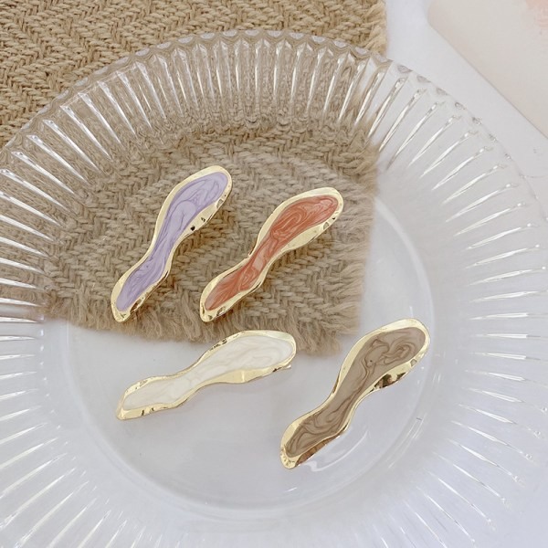 IC 4 hiuspinnit pääpanta banaanipinnit lila beige curry oranssi
