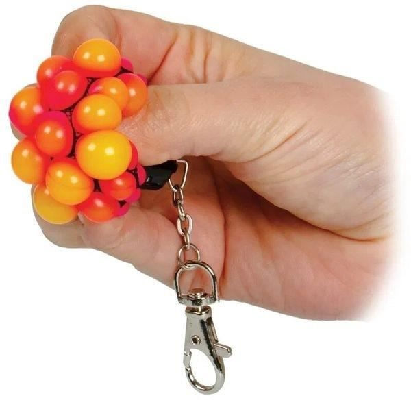 Anti-stress nøkkelring med avslappende pusteball * Mål: 5 x 3 x 3 cm * Farge: tilfeldig Funksjoner: nøkkelring, IC