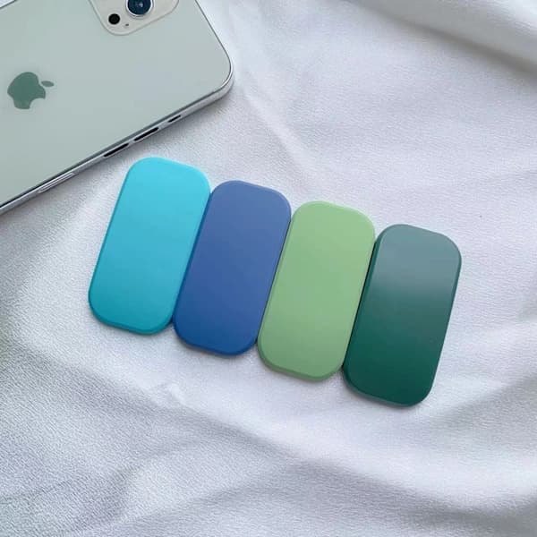 Värillinen spraymaalattu macaron-värinen läpinäkyvä push-pull-kiinnike, litteä tukikiinnike, yksivärinen puhelinteline läpinäkyvä Push pull -kiinnike transparent Push pull bracket
