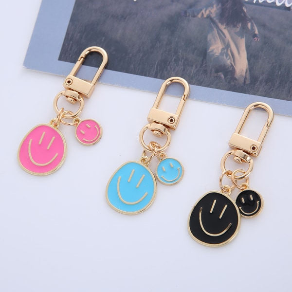Söt Happy Expression Nyckelring för Kvinnor 3-pack Set Liten Vit Svart Rosa