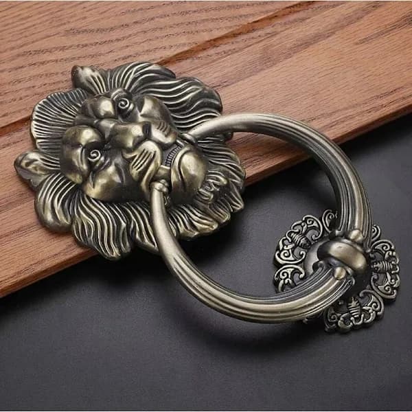 Dørhammer Løvehoved, Bronze