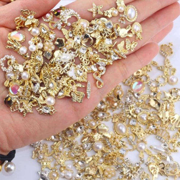 IC 50 st guld nagelberlocker för akrylnaglar, blanda stilar glänsande pärla legering spik strass Blomma Fjäril Hjärta Star Charms
