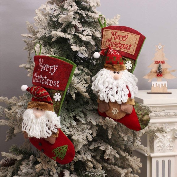 IC Julstrumpa med hängande jultomten tecknad godissäck