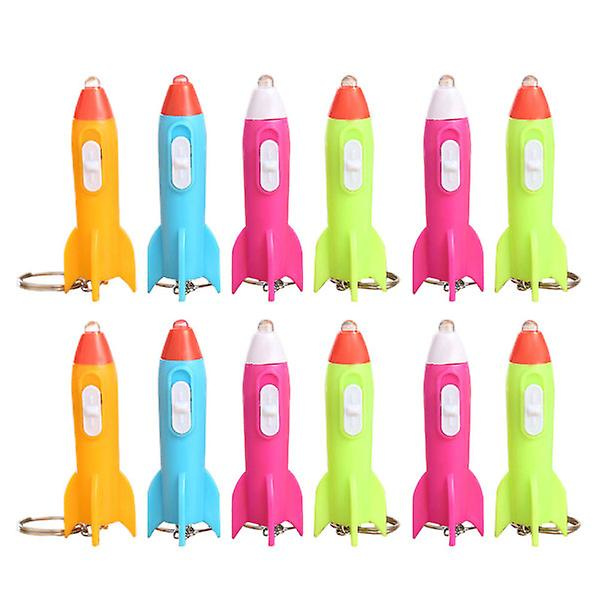12 kpl Lasten Taskulamput Mini Avaimenperät Lasten Mini Taskulamput Led Raketti Avaimenperä Mini Taskulamppu Avaimenperä (6.7X2CM, Satunnainen väri 12 kpl) IC