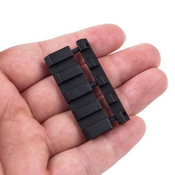 IC 1. st. 11 mm til 22 mm Snap-in Skinnemonteringsadapter med fjeder Doveta