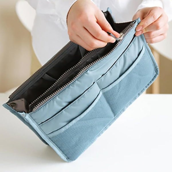 IC Kvinnors blå kosmetisk väska förvaringsväska Dragkedja Skönhet handväska