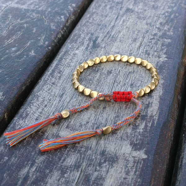 Handgjort tibetanskt kopparpärlarmband och -bangle unisex vaxad tråd