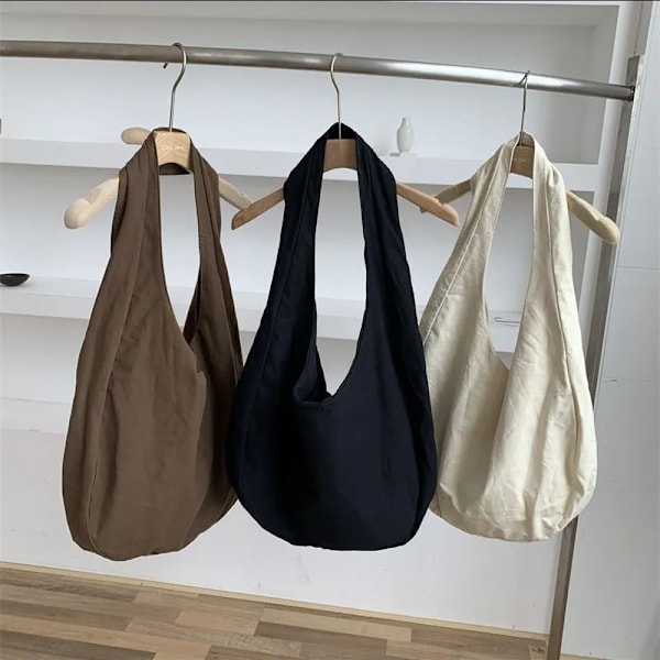 Kvinnor Canvas Crossbody-väska Oblique Cross Enkel ryggsäck Axelväska med stor kapacitet Retro Dumpling Hobos Bag Axelväska Black