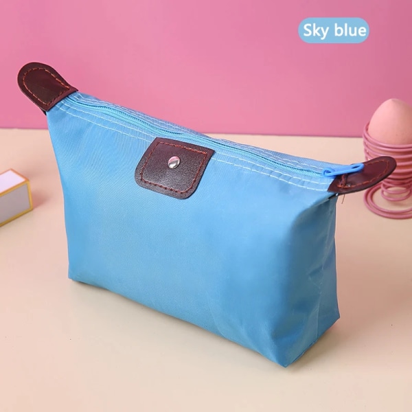 Bärbar kosmetisk väska Damresetoalettartiklar Skönhetsväska Vattentät Mini Söt Clutch Handväska Case Organizer Sky blue