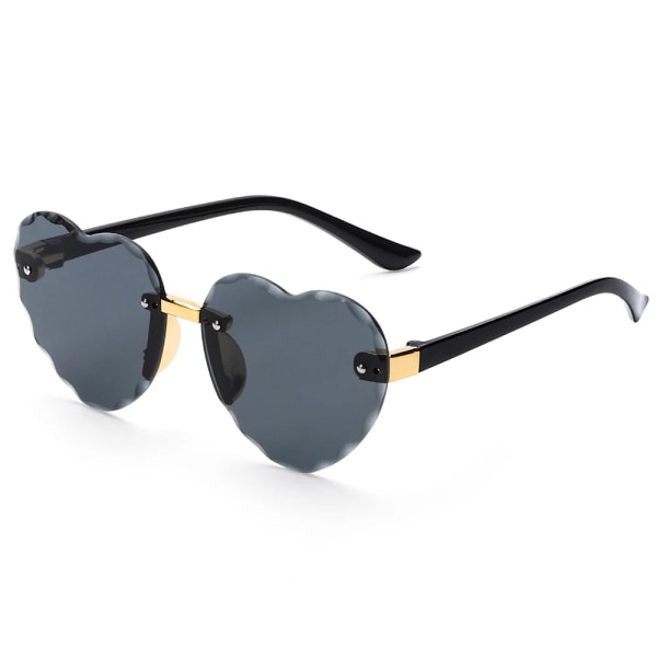 Nya hjärtlösa solglasögon Oceanlinser UV 400 skydd Söta barn/vuxna solglasögon utomhusresor glasögon för flickor Pojke C07