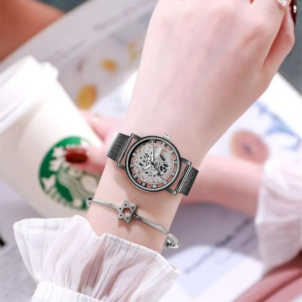 Nytt mode Topp kvinnor ihåligt skelett Faux mekanisk watch dam mesh kvarts armbandsur för kvinnor Relogio Feminino silver