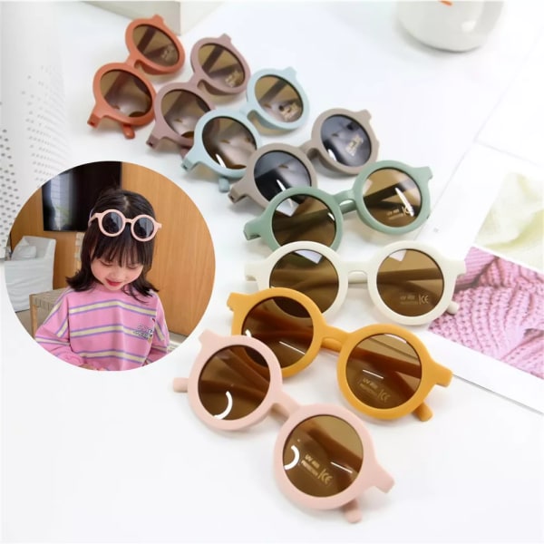 2023 New Fashion Barnsolglasögon Spädbarns Retro Solid Color Ultraviolettsäkra runda bekvämlighetsglasögon Glasögon för barn Style A-Beige