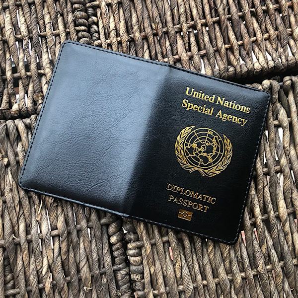 Förenta nationernas cover för män och kvinnor Specialbyråskydd för pass Laissez-passer Passinnehavare Black