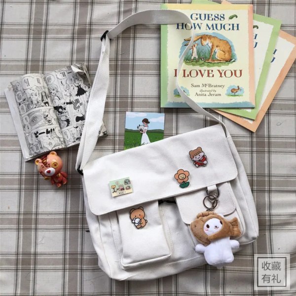 Canvasväska Enkel Kvinnor Crossbody-väska Ungdom Flickväskor Damväskor Casual Axelväskor Diagonal Messenger Skolväskor Handväskor 4 badge pendants Dinosaurs pendant