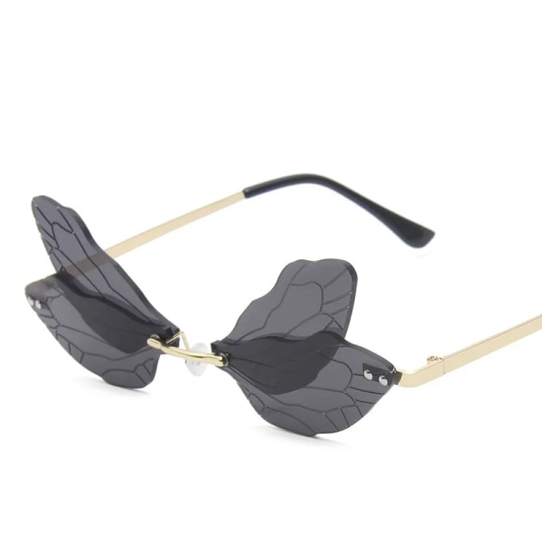 Nytt mode Dragonfly Solglasögon Kvinnor Män Märkesdesign Båglösa Wave Eyewear Lyx Trendiga smala solglasögon C1 Other