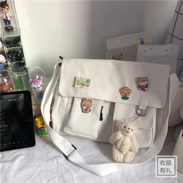Canvasväska Enkel Kvinnor Crossbody-väska Ungdom Flickväskor Damväskor Casual Axelväskor Diagonal Messenger Skolväskor Handväskor 4 badge pendants1 Dinosaurs pendant