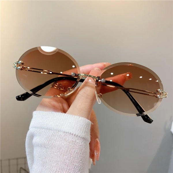Trendiga solglasögon för kvinna Sommar utan båg, avancerade solglasögon ovala modemärkesdesigner nyanser Rosa solglasögon för kvinnor UV400 Gray pink As shown