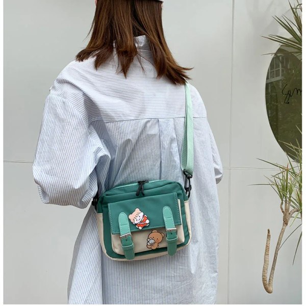 Crossbody Kvinna Ny söt tjej Canvas Student koreansk version Enaxel liten fyrkantig väska Multifunktionell matchande kors Green