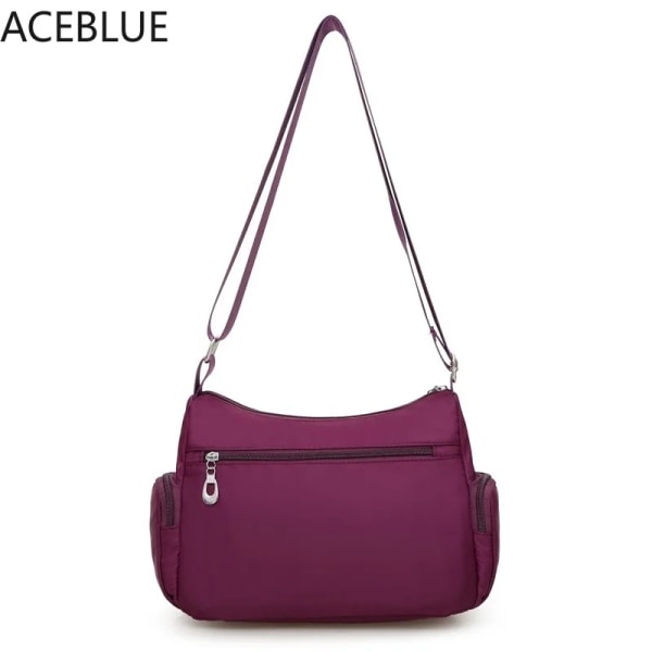 Kvinnor Casual Bolsos Messenger Bag Vattentät Nylon Axelväska Stor kapacitet Mamma Handväskor Tote Crossbody Pack Sac En huvudväska Purple 28x11x20cm