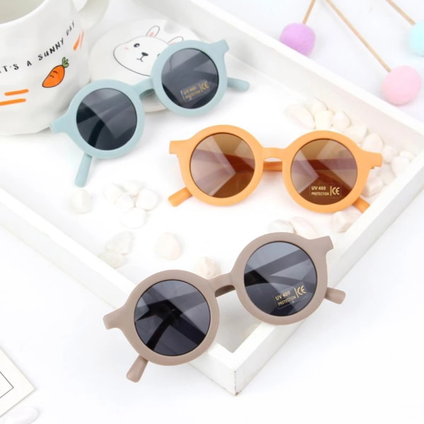 2023 New Fashion Barnsolglasögon Spädbarns Retro Solid Color Ultraviolettsäkra runda bekvämlighetsglasögon Glasögon för barn Style A-Beige