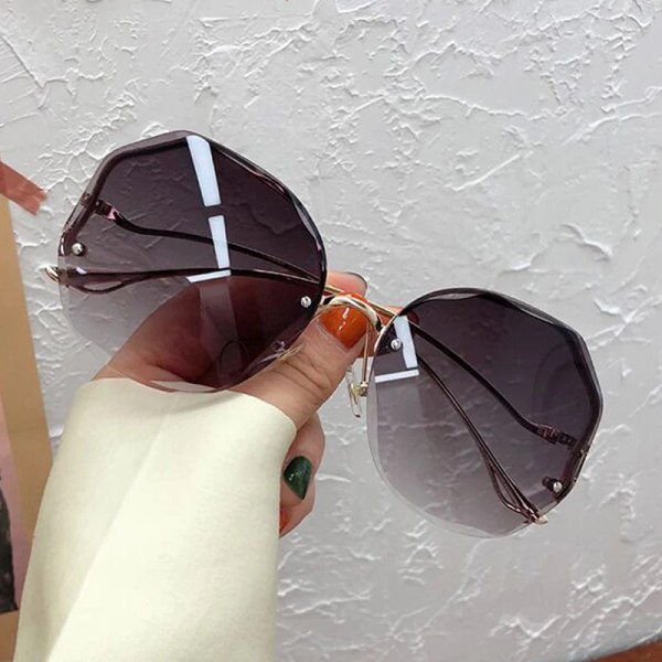 Oregelbundna runda solglasögon Kvinna Märkesdesigner Gradient Mode Solglasögon Kvinnlig båglös metall Böjda tempel Oculos De Sol Double Brown other