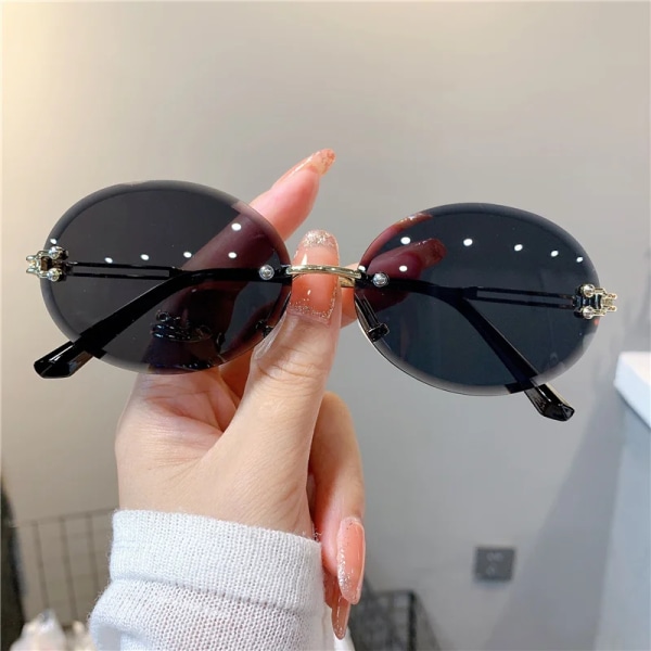 Trendiga solglasögon för kvinna Sommar utan båg, avancerade solglasögon ovala modemärkesdesigner nyanser Rosa solglasögon för kvinnor UV400 Pink As shown