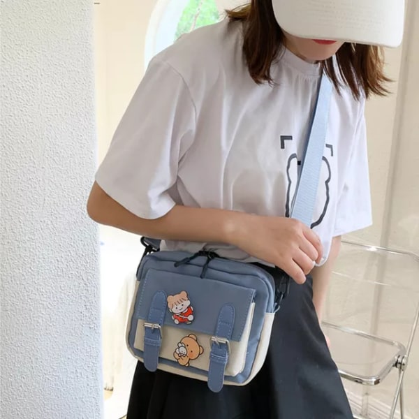 Crossbody Kvinna Ny söt tjej Canvas Student koreansk version Enaxel liten fyrkantig väska Multifunktionell matchande kors blue