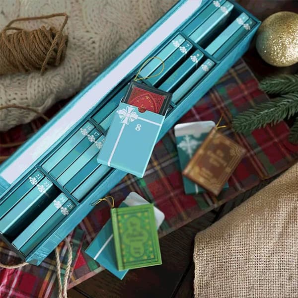 Adventskalender 2026, 24 minibog-pynt (blå) Blue