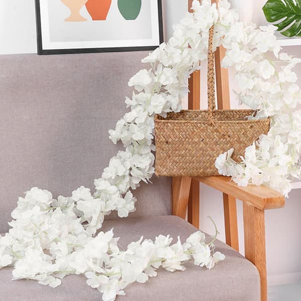 Simulerede hvide Sakura Blomsterguirlander Vinstokke til forårsbryllupsfestdekoration