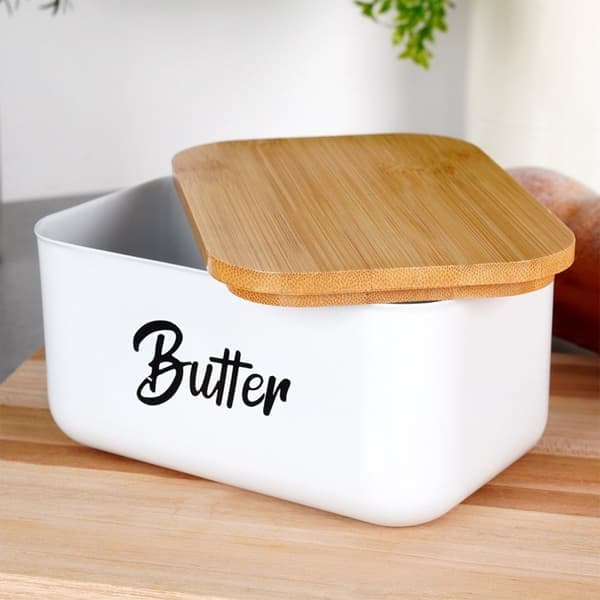 Smörask i vit stål med bambulock och \"Butter\"-text