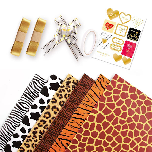 Presentpapper med leopard- och komönster, presentinslagning{hw}