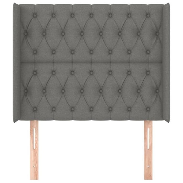 Sengegavl med sidekant 93 x 16 x 118/128, polstret møbel i mørkegrå stof.