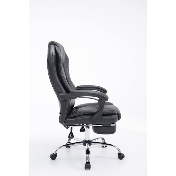 Ergonominen musta keinokuitupöytätuoli, jossa on jalkatuki ja käsinojat