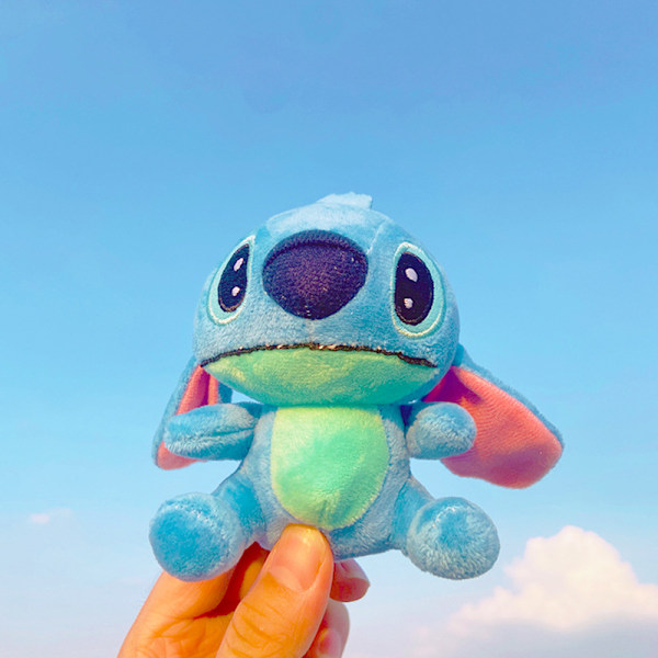 Tecknad Kuromi docka skolväska hänge docka plyschleksak par nyckelring väska hänge Plush Smiling Stitch 11cm (with keychain)