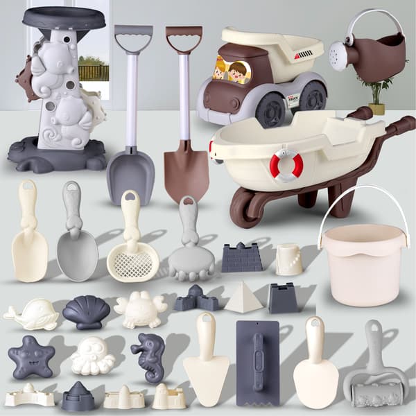 Barnstrandleksaksset, sandgrävning, vattenlek, utomhus