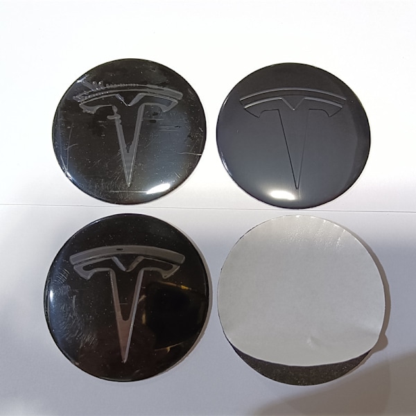Svart röd uppsättning med 4 navkapseldekaler med billogotyp för Tesla Model 3 Model X Model S