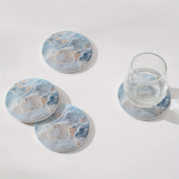 Et sæt med 6 abstrakte blå marmor coasters 6 items