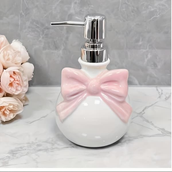 Luova vaaleanpunainen keraaminen lotionpullo rusetilla pink