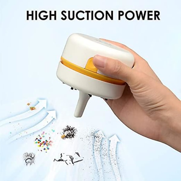 Kannettava 360° kääntyvä johdoton mini pöytäimuri USB-latauksella (Valkoinen)