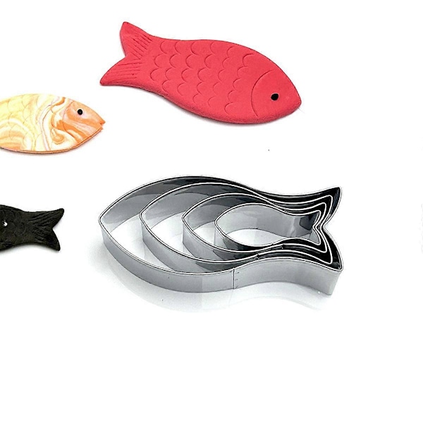 Set med 8 kakformar i rostfritt stål, fiskmotiv, för bakning