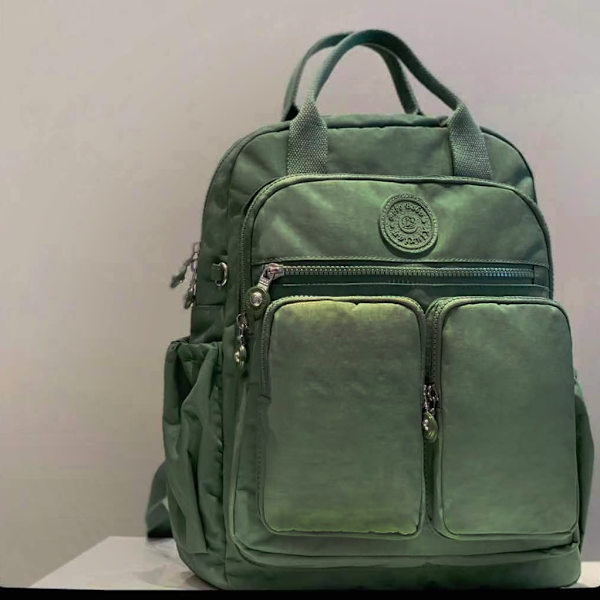 Muodikas naisten reppu vedenpitävä nailon pehmeä kahva kiinteä monitoimitasku matka vetoketju naisten koululaukku Thick Plant Green 11.4x3.9x14.6inches