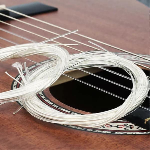 Klassiska gitarrsträngar trägitarrsträngar transparent nylon affv