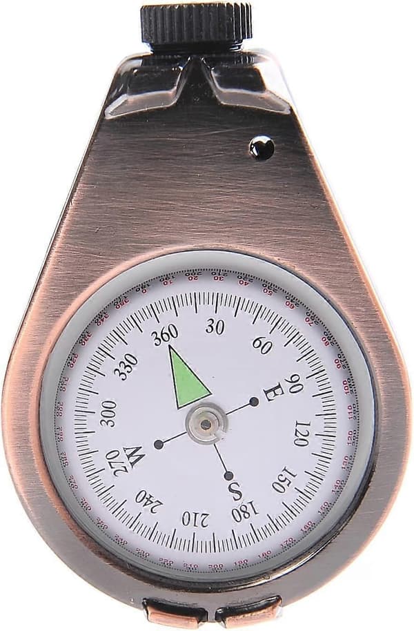 Kompass med væske i etui av solid metall
