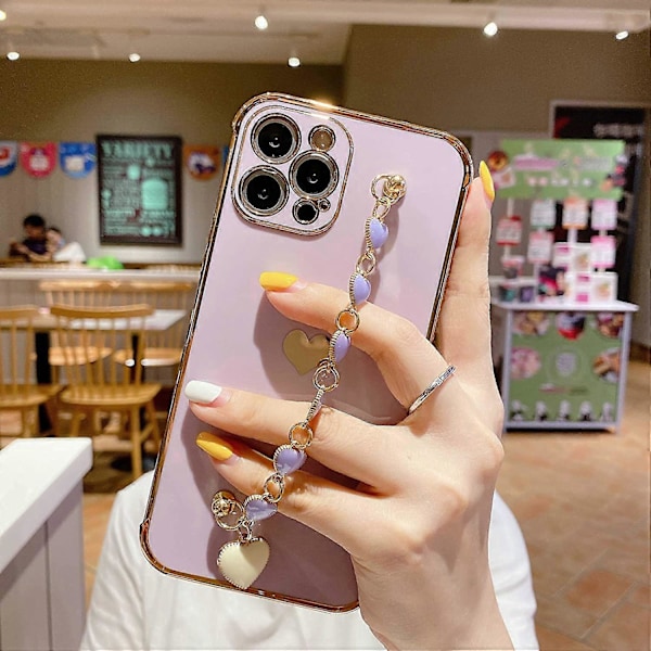 Sött iPhone 13 Pro Max Skal med Kärlekshjärta Armbandsrem, Pläterat Guldglitter Skydd, TPU Stötfångare Skyddande Mobilskal 6.7\" (Lila)
